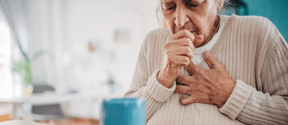 Es ist eine Frau mit Schluckbeschwerden zu sehen. 